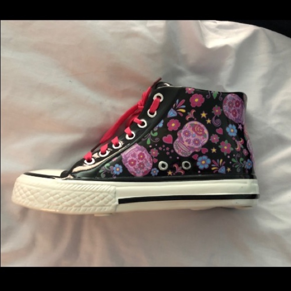 Ceramic sneaker money bank , with skull designs